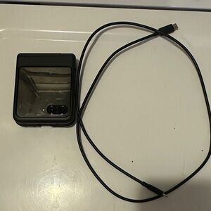 Motorola Black Foldable Cell Phone with Cable